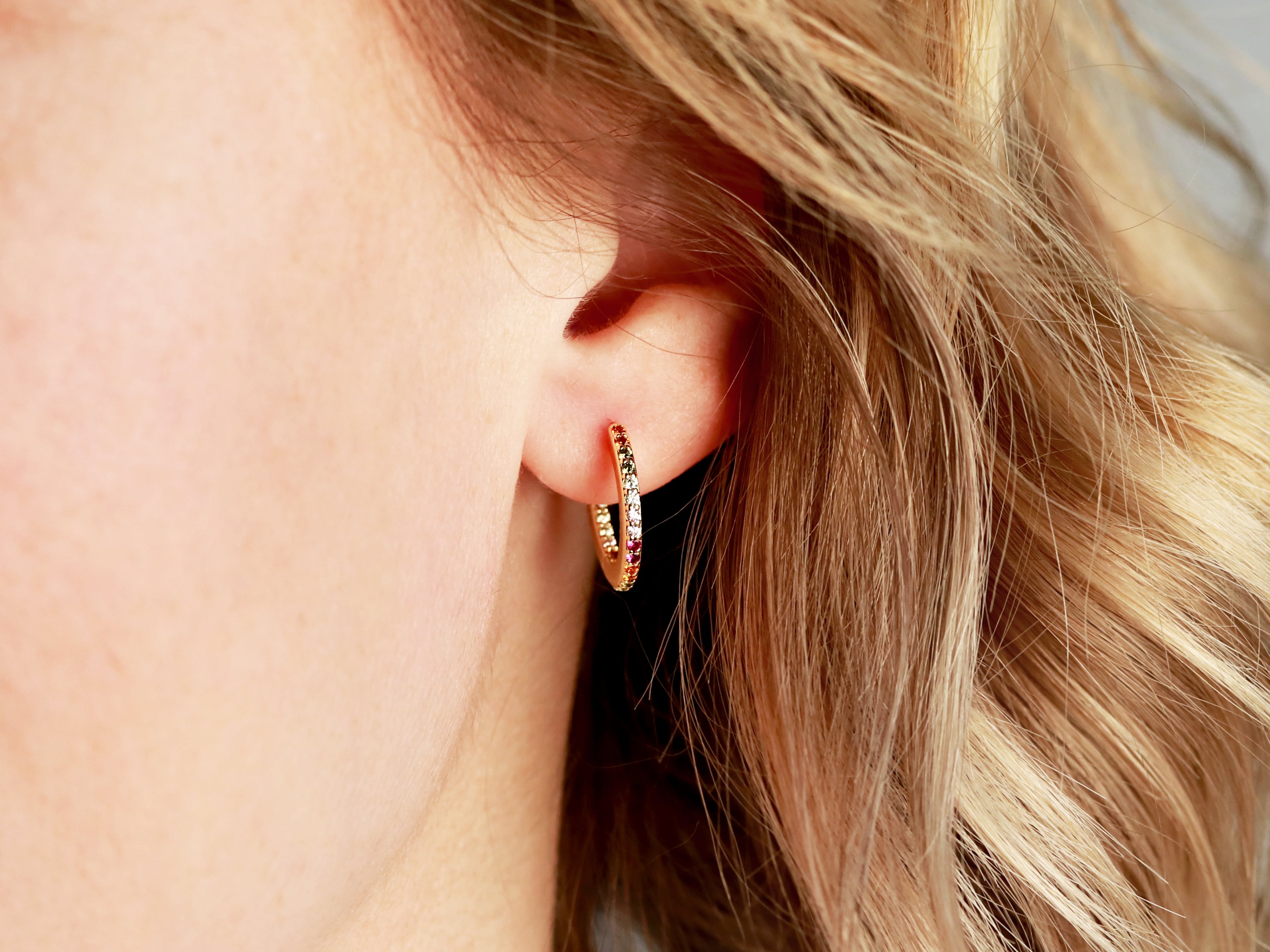 Rainbow hoop earrings by Tom Design.