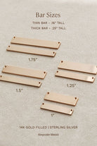 various bar sizes, including thin bars, thick bars, and gold-filled bars, arranged on a beige background.