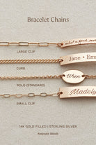 a collection of bracelet chains in various sizes and designs, including a large clip, a small clip, and a personalized bracelet with engraved names.