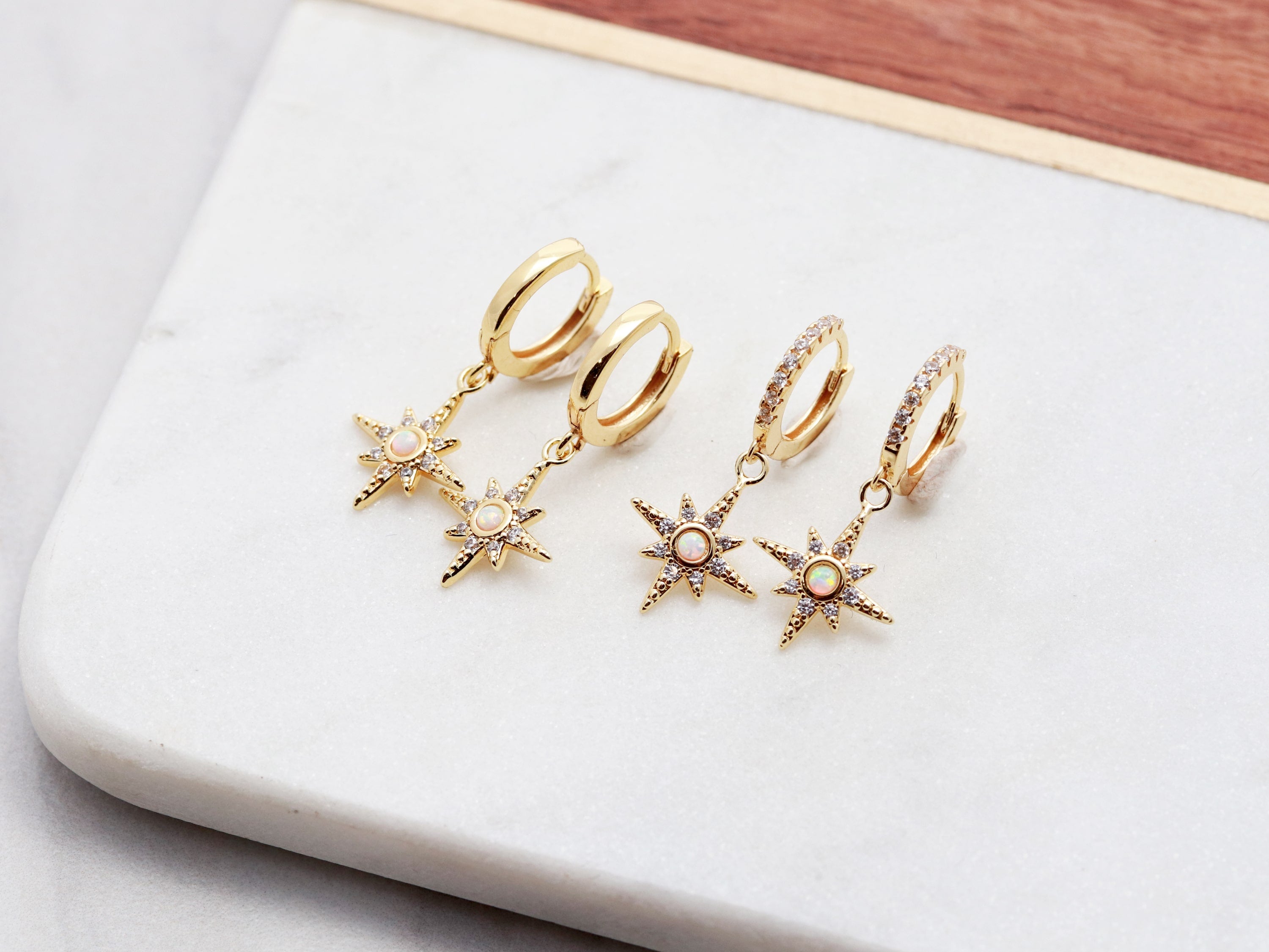 Starburst Huggie Earrings in gold and silver from Tom Design Shop.