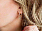 Starburst Hoop Earrings in gold with CZ. Offered from Tom Design Shop.
